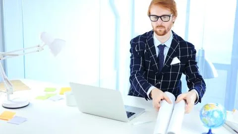 Redhead Architectural Engineer Holding Blueprint, Freelancer Desginer Stock Photos
