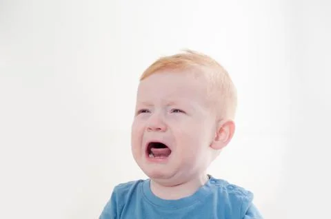 Redhead boy crying Foto stock