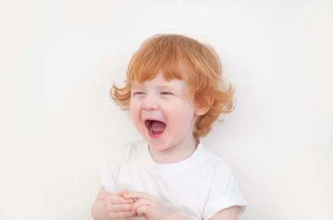 The redhead boy laughs Foto stock