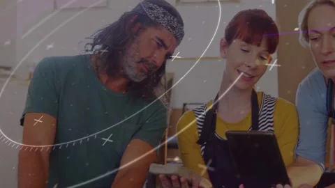 Redhead designer showing tablet causing crew matching tile to mockup overlay Stock Footage 333004754