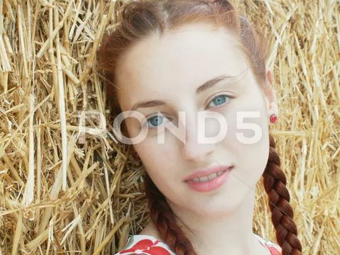 A redhead girl. Stock Photos