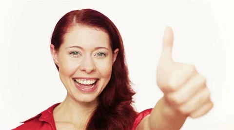 Redhead holding thumbs up Video stock 8558961