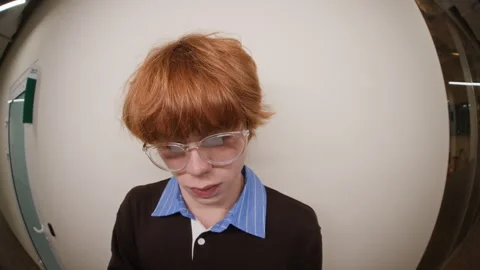 Redhead Man with Glasses Typing on Laptop in Office Fisheye View Stock Footage 343701451