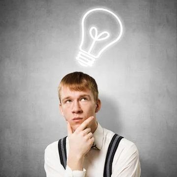 Redhead student thinking about some problem Foto stock