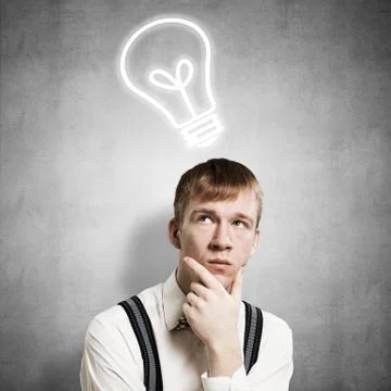Redhead student thinking about some problem Foto stock