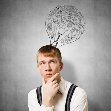 Redhead student thinking about some problem Foto stock