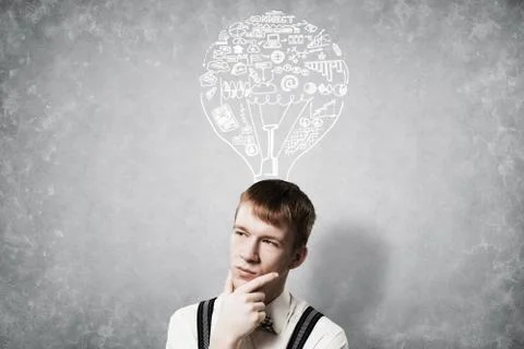 Redhead student thinking about some problem Foto stock