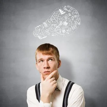 Redhead student thinking about some problem Foto stock