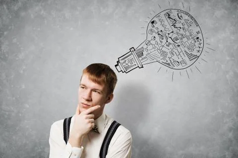 Redhead student thinking about some problem Foto stock