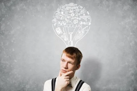 Redhead student thinking about some problem Foto stock