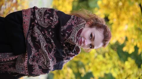 Redhead woman in autumn park Stock Footage 291320153
