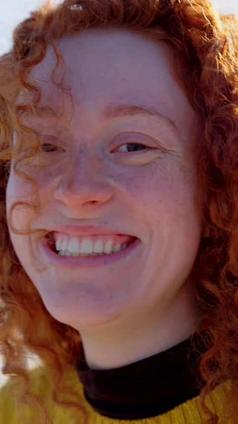 Redhead woman smiling while looking at camera Stock Footage 271595584