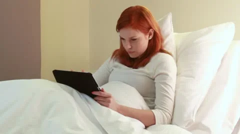 Redhead women in hospital with tablet Stock Footage 10743053