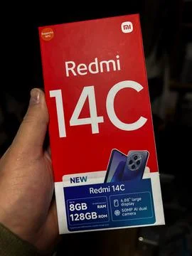 Redmi 14C Smartphone Box Featuring Specifications and Design Stock Photos