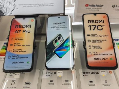Redmi Smartphone Display at Electronics Store Showroom Fotos Stock