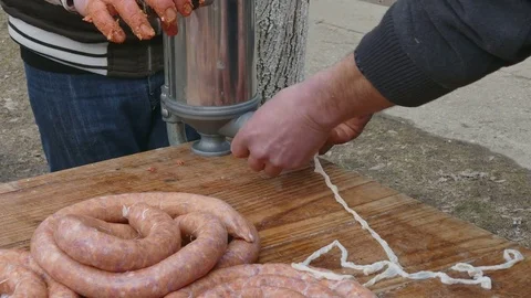 Redneck butcher preparing sausage Stock Footage