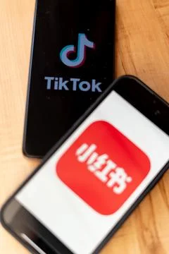 RedNote and TikTok logos displayed on smartphones Stock Photos
