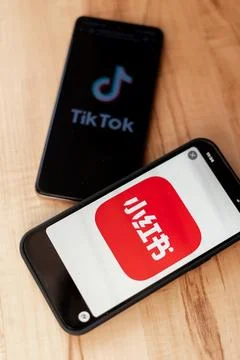 RedNote and TikTok logos displayed on smartphones Stock Photos
