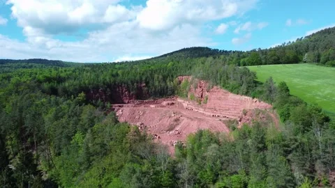 Redstone quarry near fields and forests Stock Footage 154386236
