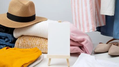 Reduce and reuse concept. Preparing clothes for swap. Waste problem in fashio Stock Photos