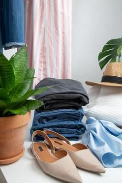 Reduce and reuse concept. Preparing clothes for swap. Waste problem in fashio Stock Photos