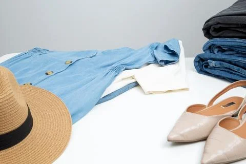 Reduce and reuse concept. Preparing clothes for swap. Waste problem in fashio Stock Photos