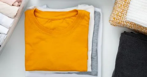 Reduce and reuse concept. Preparing clothes for swap. Waste problem in fashio Stock Photos
