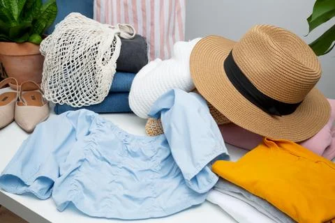 Reduce and reuse concept. Preparing clothes for swap. Waste problem in fashio Stock Photos