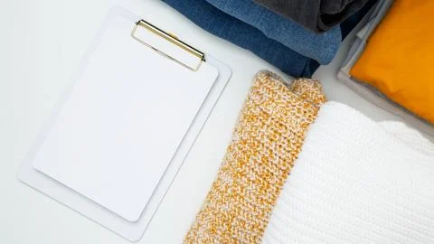 Reduce and reuse concept. Preparing clothes for swap. Waste problem in fashio Stock Photos