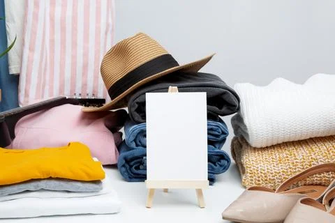 Reduce and reuse concept. Preparing clothes for swap. Waste problem in fashio Stock Photos