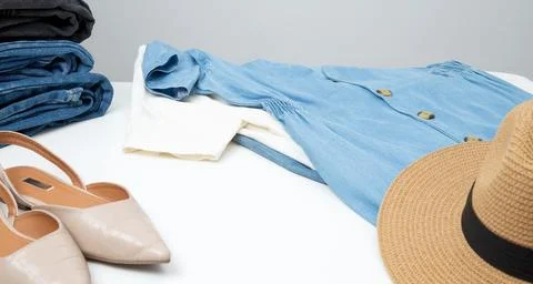 Reduce and reuse concept. Preparing clothes for swap. Waste problem in fashio Stock Photos