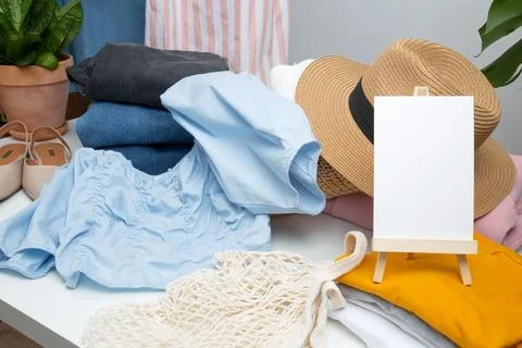 Reduce and reuse concept. Preparing clothes for swap. Waste problem in fashio Stock Photos