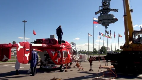 Reducer on crane truck cable rises for installation on Ka-226 helicopter. Stock Footage 106491713