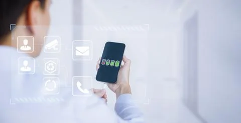 Reducing application usage to save battery power, White USB Cable Connected w Stock Photos