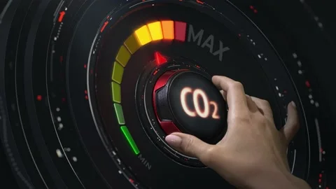 Reducing carbon dioxide emission trace. The hand moves the CO2 reduction handle Stock Footage 174626085