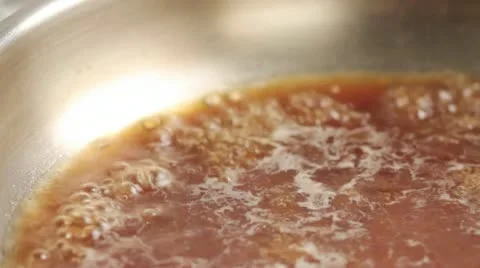 Reducing a jus Stock-Footage 24664077