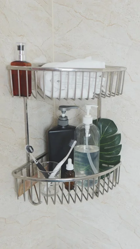 Reducing visual clutter. Bathroom shower caddy storing hygiene products and Video stock 338391897
