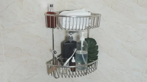 Reducing visual clutter. Shower caddy organizing bath products, personal hygiene Video stock 338390012