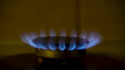 Reduction of blue gas flame 4K Stock Footage 218374176