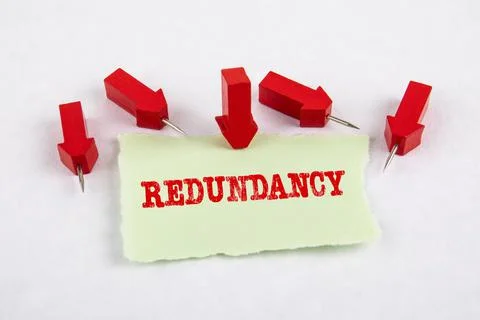 Redundancy. Note sheet and red arrows on white paper background Stock Photos