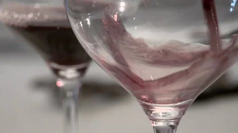 Redwine in two glasses with white background Stock Footage 34269794