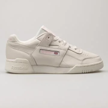 Reebok Workout Plus white and pink sneaker Stock Photos