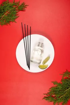 Reed diffuser aroma with lime and evergreens Stock Photos