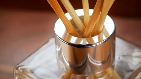 Reed diffuser bottle and sticks extreme close up stock footage Stock Footage 103288675
