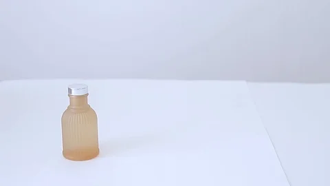 Reed diffuser bottle and sticks extreme close up stock footage Stock Footage 125397213