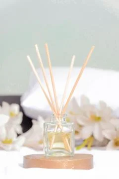 Reed diffuser essential aromatherapy oil in the bedroom decoration Stock Photos