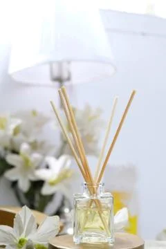 Reed diffuser essential aromatherapy oil in the bedroom Stock Photos