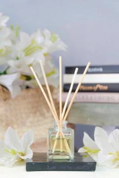 Reed diffuser essential aromatherapy oil in decorative materials Stock Photos