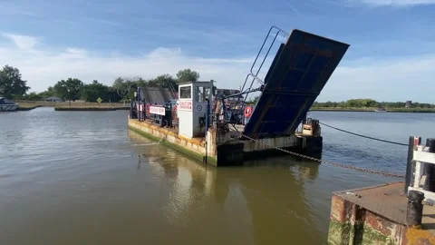 The Reedham Ferry across the River Yare in Norfolk, England. Stock Footage 341890257