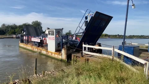 The Reedham Ferry across the River Yare in Norfolk, England. Stock-Footage 341890457